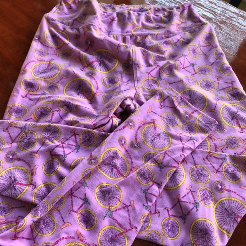 LulaRoe leggings-bike pattern. Pink background